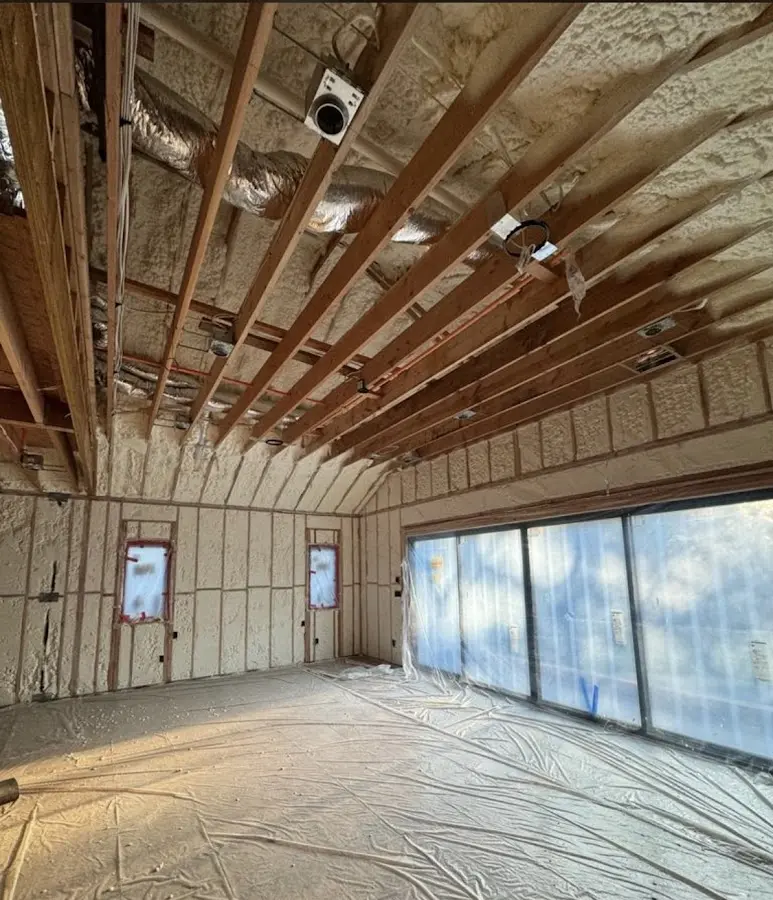 Interior walls and ceiling insulated with spray foam during new construction in Allentown